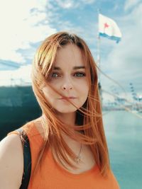 Portrait of young woman at beach