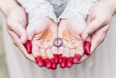 Close-up of woman holding hands