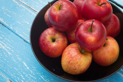 High angle view of apples in bowl on table