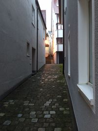 Narrow walkway in city