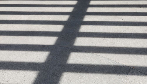 High angle view of shadow on street