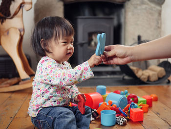 Cute girl playing with mobile phone