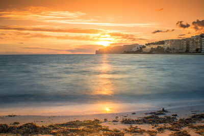 Scenic view of sunset over sea