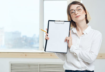 Young woman using digital tablet