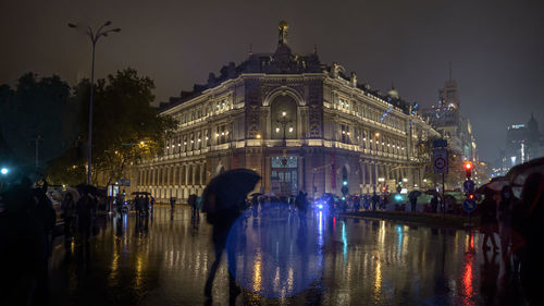 Group of people in front of building