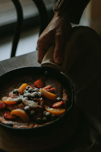 High angle view of person preparing food in kitchen