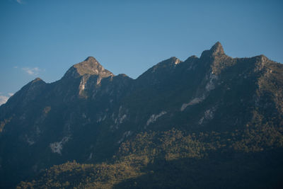 Scenic view of mountains against clear sky