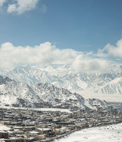 Scenic view of snowcapped mountains against sky