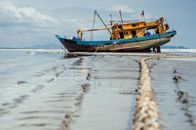 Boats moored in sea