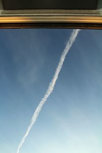 Low angle view of vapor trail in sky