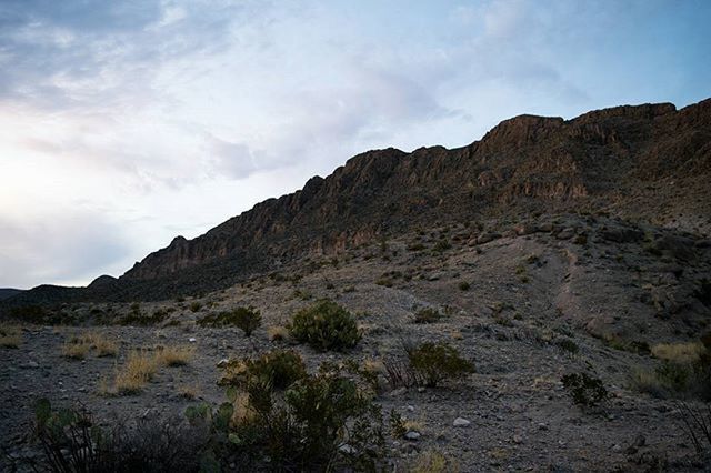 mountain, sky, tranquil scene, tranquility, landscape, scenics, beauty in nature, nature, cloud - sky, mountain range, non-urban scene, cloud, rock - object, rock formation, geology, physical geography, remote, idyllic, day, outdoors