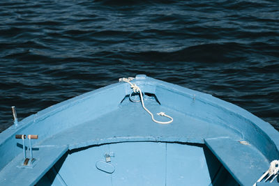 Cropped image of blue boat in lake