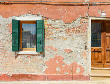 Closed wooden door of old building