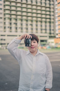 Man photographing with camera