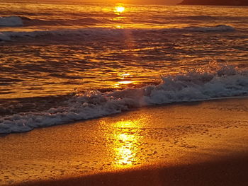 Scenic view of beach during sunset