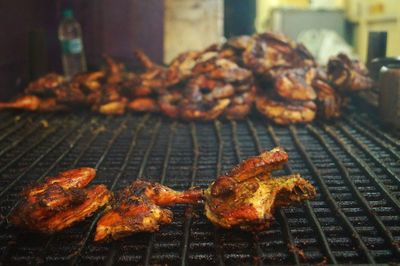 Close-up of meat on barbecue grill