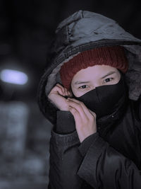Portrait of boy wearing hat during winter