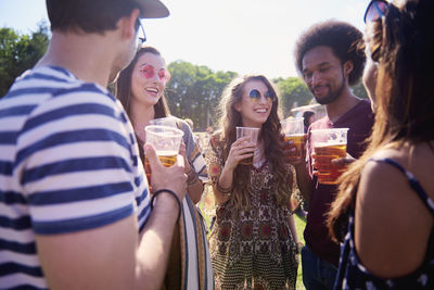 Group of people at party during sunny day