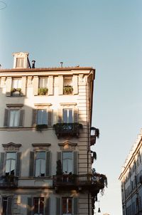 Low angle view of buildings against clear sky