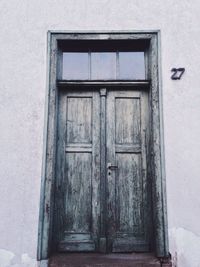 Closed wooden door of house