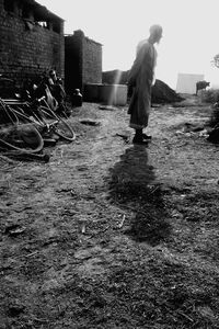 Full length of woman standing in city