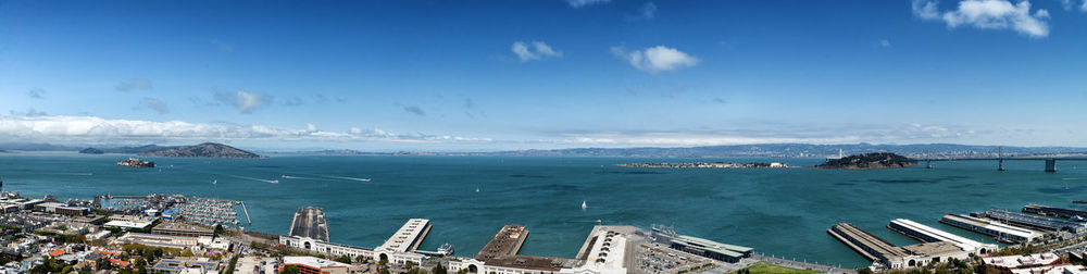 Panoramic view of san francisco bay against blue sky
