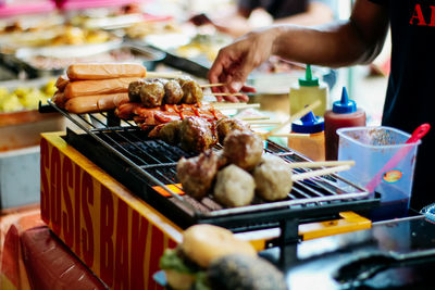 Close-up of meat on barbecue grill