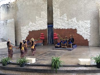 Group of people in front of building