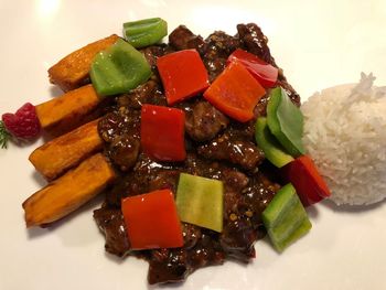 High angle view of chopped vegetables in plate