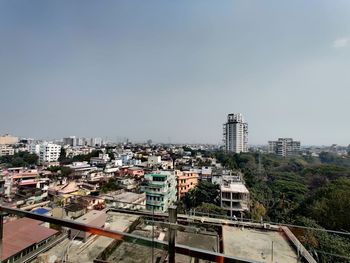 High angle view of buildings against clear sky