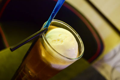 Close-up of beer glass on table