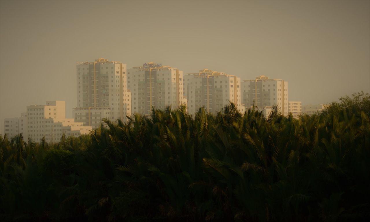 BUILDINGS AGAINST SKY