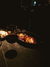 High angle view of wine in glass on table