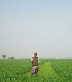 Scenic view of grassy field
