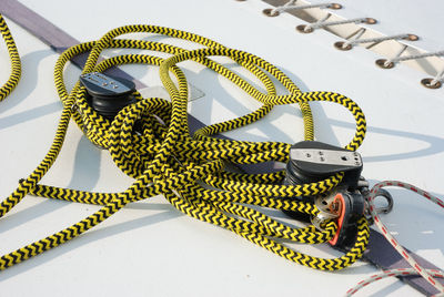 High angle view of ropes on boat deck