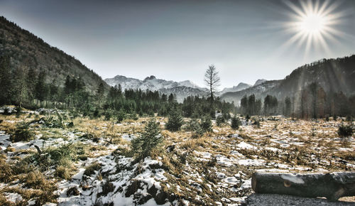 Scenic view of snowcapped mountains against sky