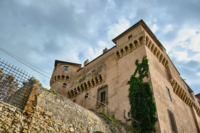 Low angle view of historic building against sky
