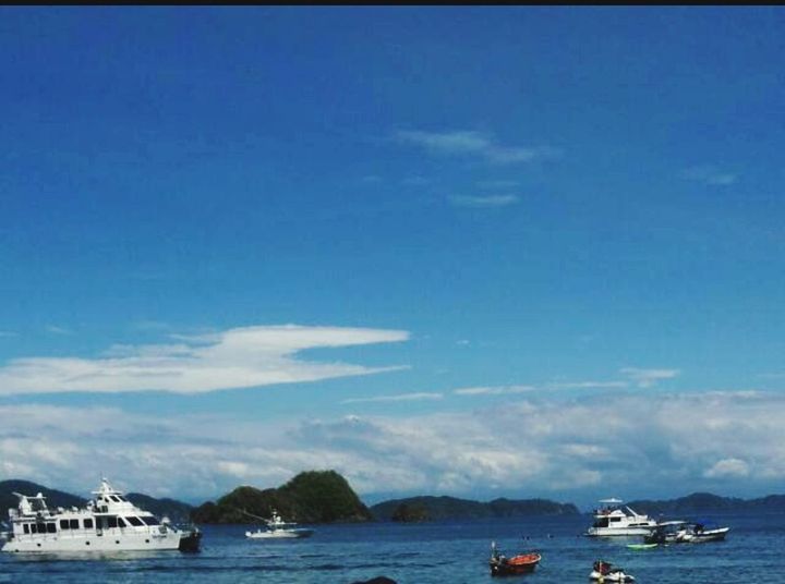 sky, nautical vessel, transportation, sea, water, mode of transportation, cloud - sky, nature, day, blue, ship, no people, scenics - nature, travel, waterfront, architecture, tranquility, auto post production filter, outdoors, passenger craft, yacht