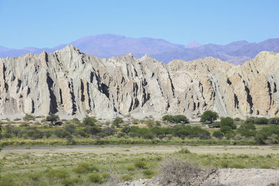 Scenic view of rocky mountains against sky