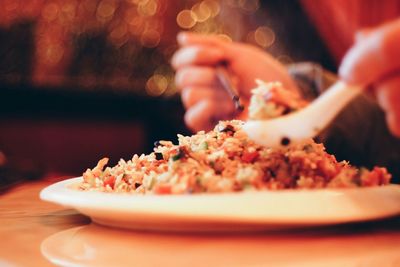 Close-up of rice served in plate on table