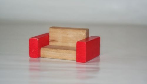 Close-up of red stack on table