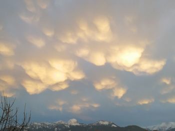 Low angle view of mountain against sky during sunset