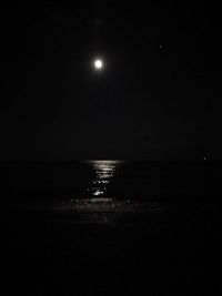 Scenic view of sea against sky at night