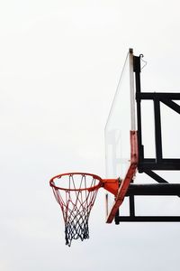 Low angle view of basketball hoop against sky