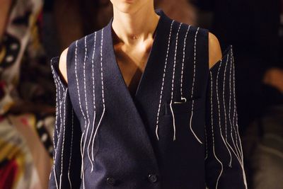 Midsection of fashionable woman at fashion show