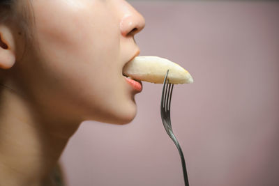 Close-up of woman holding ice cream