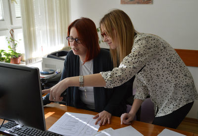 Businesswomen working with computer in office