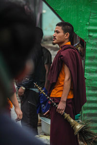 Side view of couple looking at camera