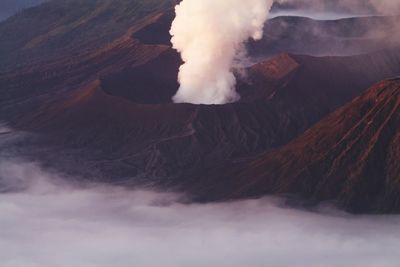 Scenic view of volcanic mountain against sky