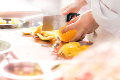 Midsection of person preparing food